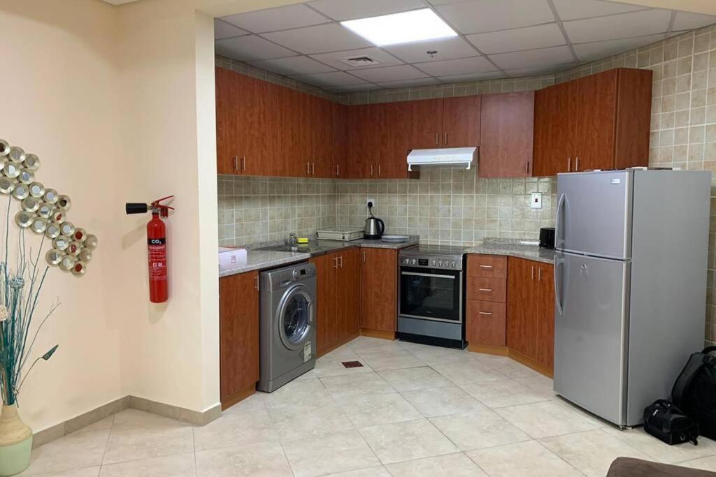 Appartamento Cozy 2Bhk Near To Dmcc Metro Station -505 Dubai Esterno foto